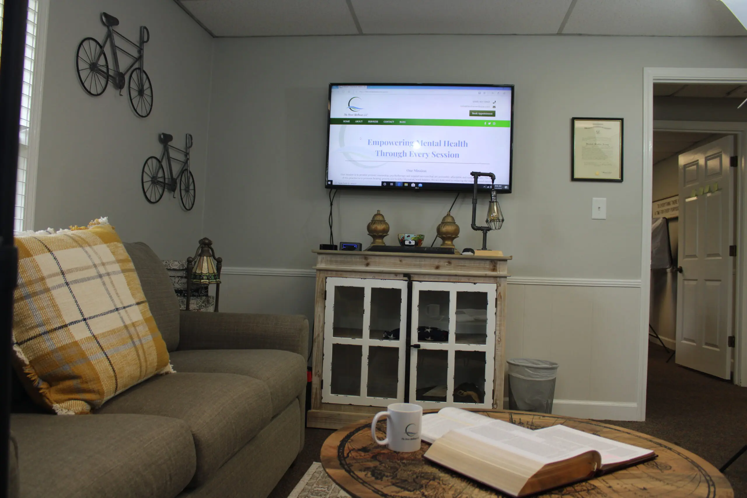 A living room with a couch and television