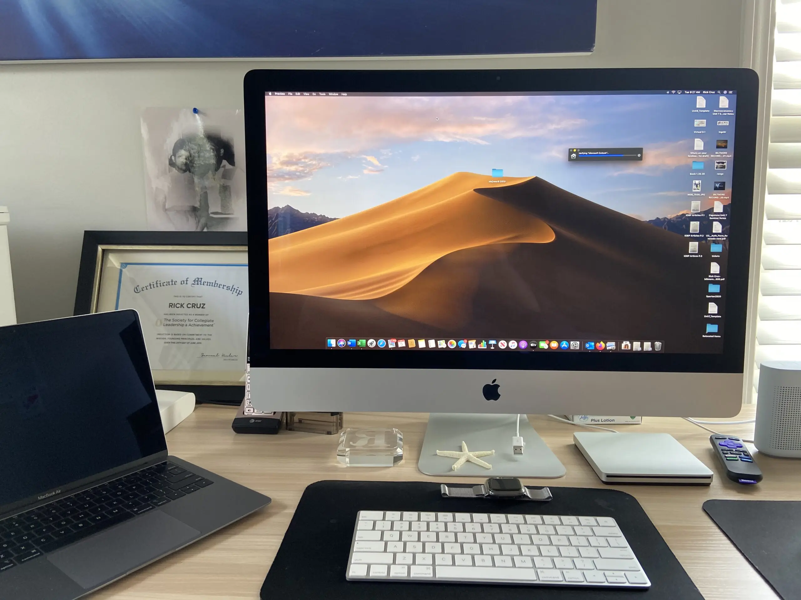 A computer monitor sitting on top of a desk.